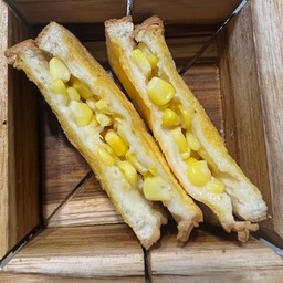 ข้าวโพดอบเนย ชิ้นละ