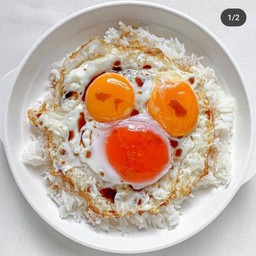 Fried egg with steamed rice