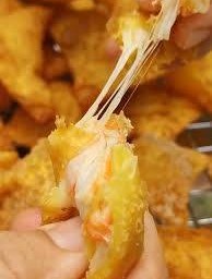 เกี้ยวหมูกุ้งชีสสสสส 4 ชิ้น