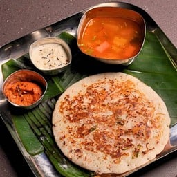 Tomato uttapam served with sambhar