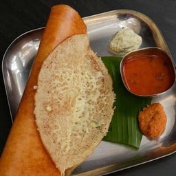 Cheese dosa served with sambhar coconut chutney
