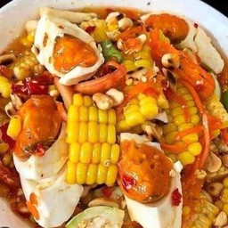 ยำข้าวโพดไข่เค็มไชยา