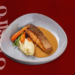 Salmon with Mashed Potatos, Sauteed Vegetebles, Ratatouille, and Bisque Sauce