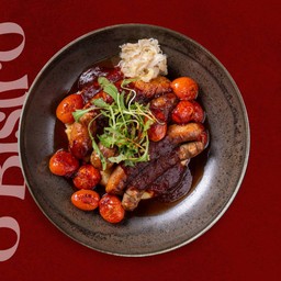 Mixed Sausages with Mashed Potatos, Roasted Tomatos, Sauerkraut and Smoked BBQ Sauce