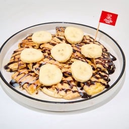 ปังโรตีกล้วย ราดนมช็อคโกแลต