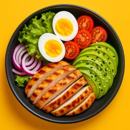 สลัดผัก อกไก่ 300 g ย่างน้ำมันมะกอก อะโวคาโดโรยงา มะเขือเทศสด ไข่ต้ม 1 ฟอง หอมแดง