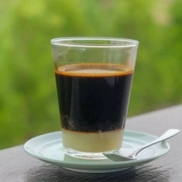 กาแฟโบราษนมร้อน