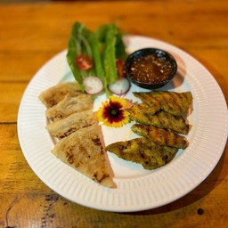 Chicken satay with roti