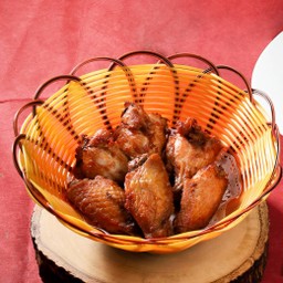 ปีกไก่ทอดบุญตงกี่ 6 ชิ้น