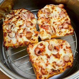 ปังหน้าพิซซ่าปูอัดหน้าล้น