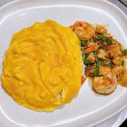 Scrambled egg  over rice with basil spicy Shrimp