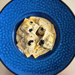 Mushroom Ravioli with Truffle Cream Sauce.