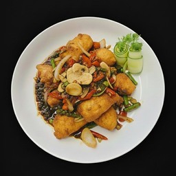 ปลากระพงผัดพริกไทดำ