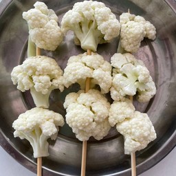 (A115) ดอกกะหล่ำย่างเนย