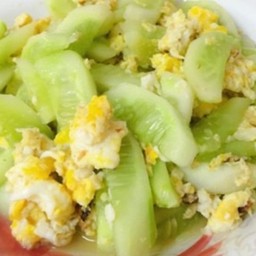 Ki02.67 ผัดน้ำมันพืช แตงร้าน 100 กรัม +ไข่ 3 ฟอง