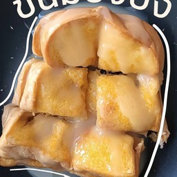 ขนมปังปิ้งราดเนย+นม+น้ำตาล  1แผ่น