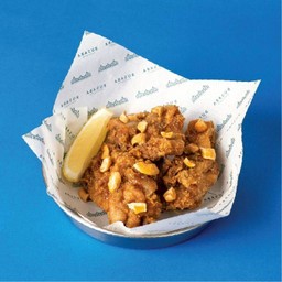 สะโพกไก่ทอดซอสน้ำปลา