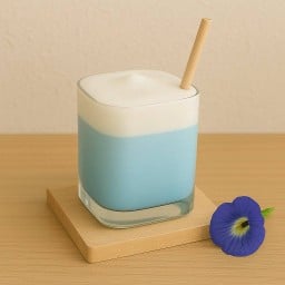 อัญชันนมสด