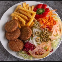 Falafel plate with fries and salad