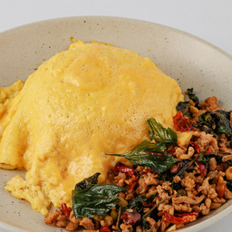 ข้าวกะเพราหมูไข่ข้นSpicy Pork Basil with Egg over Rice.