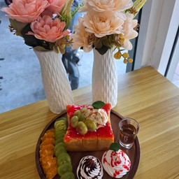 ร้านนมล้น -