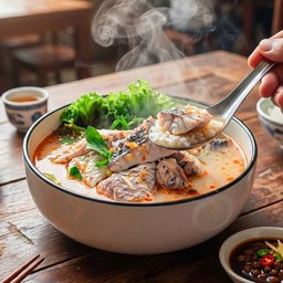 ข้าวต้มต้มยำปลากระพง