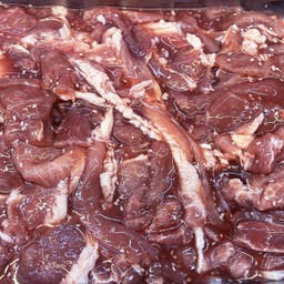 หมูหมักงา (100 กรัม)