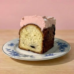 Cinnamon Roll With Pink Buttercream