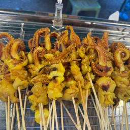 หมึกย่างพอดีคำ (ตลาดพัฒนา)