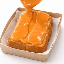 ขนมปังปิ้ง ราดสังขยาชาไทย