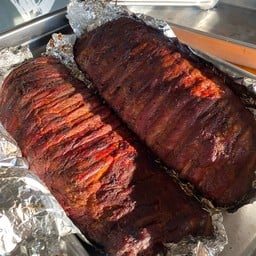 Delicious smoked pork ribs from our special rub. ซี่โครงหมูรมควันสูตรลับของร้าน