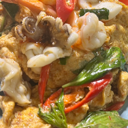 ไข่ข้นห่อหมกทะเลราดข้าว