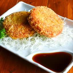 Ta โคโรเกะมัน (หมู)