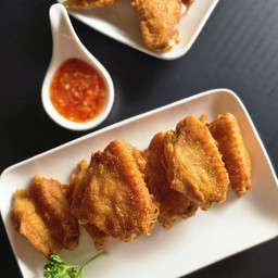 ปีกกลางทอด