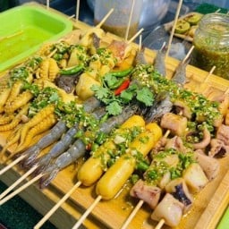 หมึกย่างหน้าโรงพยาบาลไทรน้อย