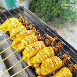 ปลาหมึกย่างตัวกลม สาขาตลาดนัดเย็นธีรรัตน์