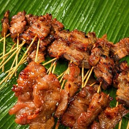 หมูปิ้ง 10 ไม้+หมูยอทอด 2 ชิ้น+น้ำพริกตาแดง 1+ข้าวเหนียว 2 ห่อ