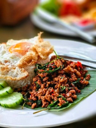 Try our delicious Pad Ka Prao (Pad Krapow) at GORD CHIANGMAI KITCHEN! This classic Thai stir-fry features fragrant basil, garlic, and chili, with your choice of meat and a perfectly crispy egg on top. It's a must-try for anyone craving authentic Thai flavors!