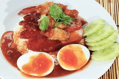 BBQ Pork , fried Ferment pork and Crispy Pork over the steam rice 