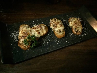 Bruchetta with mushrooms mozzarella cheese 