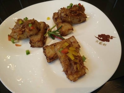 Deep-fried turnip cake with bell peppers in X.O. chili sauce