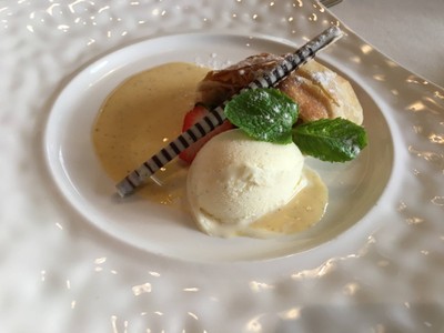 Warm Apple Strudel with Vanilla Ice Cream and Cinnamon Sauce