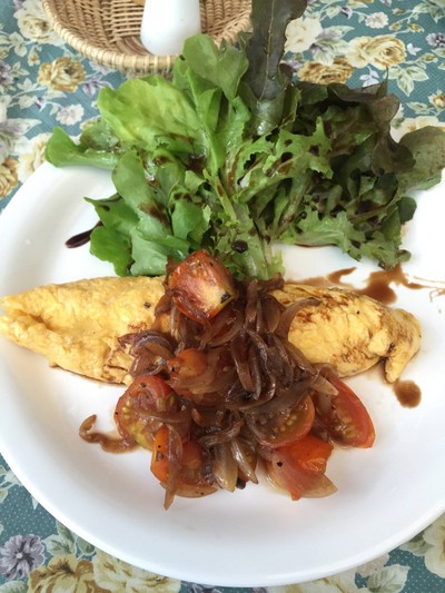 Omelette served with Stir-fried Heirloom Tomatoes and Balsamic Vinaigrette