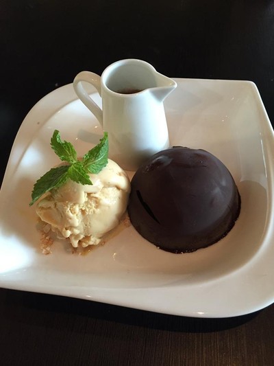 melted piñata flourless chocolate cake