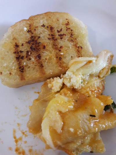 Three-Cheese Lasagna served with garlic bread