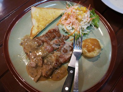 สเต็กหมูสันนอกซอสเห็ด69.-