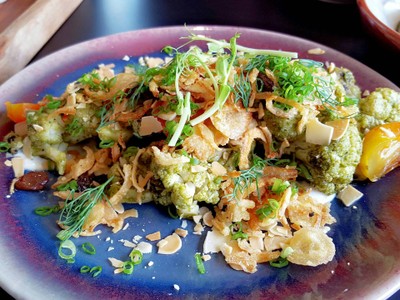 Roasted cauliflower, chermoula, pickled raisins, almonds, confit tomatoes