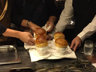 Lobster bisque puff soup with truffle and lobster tail
