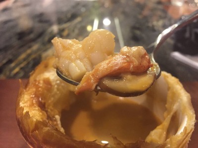 Lobster bisque puff soup with truffle and lobster tail