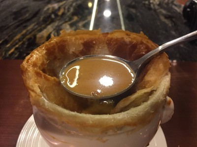 Lobster bisque puff soup with truffle and lobster tail